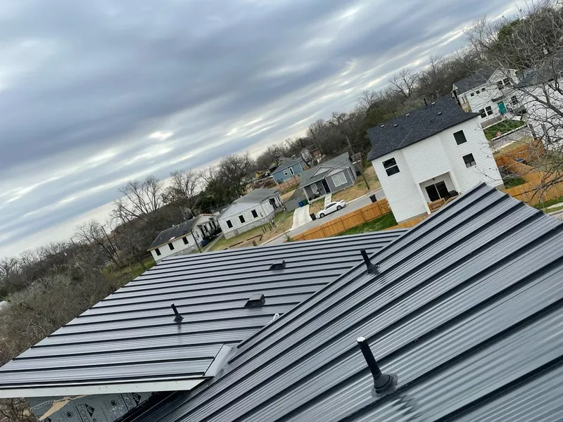 Standing seam metal roof panels with vents for Skylight Repair in Pepper Pike